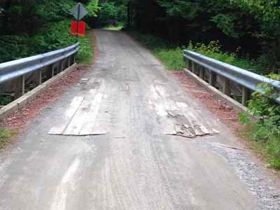 Creamery Bridge deck showing worn planking