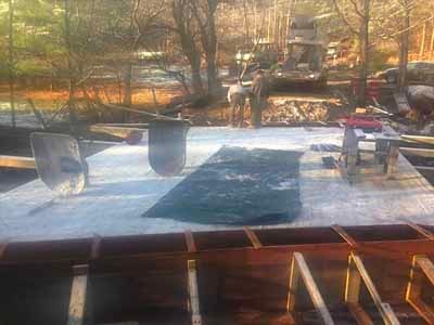 Owl Brook Bridge - fresh concrete deck surface with anchor bolts