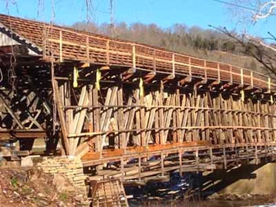 Cabin Creek covered bridge exterior with timber truss siding
