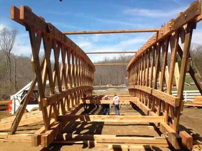 Gold Mine covered bridge on falsework during restoration over stream