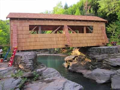 Tuscarora covered bridge completed exterior spanning rocky stream gorge