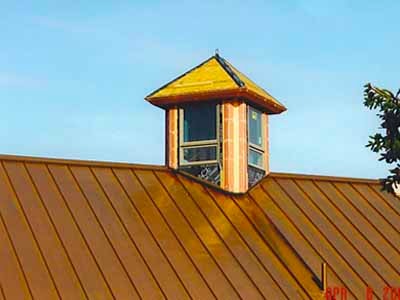 Copper-roofed cupola detail on completed Garner barn